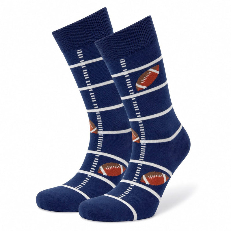 Pair of blue socks with football designs on a white background