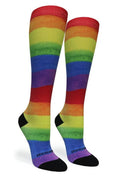 Rainbow striped socks on a white background